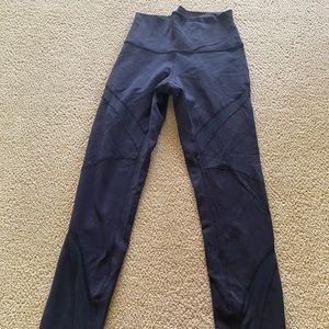 Lululemon black high leggings with mesh cutouts